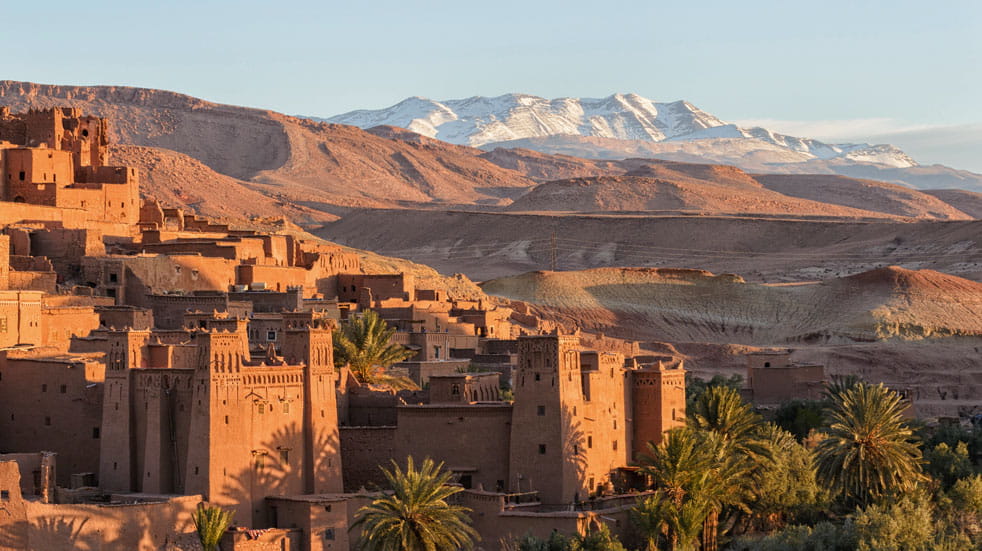 Morocco’s Atlas Mountains rise majestically behind Ait Benhaddou Kasbah